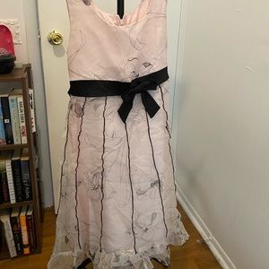 Pale pink dress with black ribbon